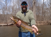Josh with an awesome 24 inch Muskegon river brown