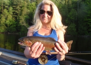 Amy\'s first ever trout caught with a dry fly