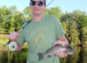 Brad with his first ever trout caught on a fly rod