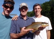 John & his two sons with a really nice brown trout caught w/dry fly