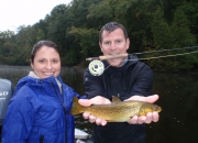 Scott & Nicole with a nice Brown Trout taken with a dry fly