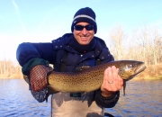 Chris holding an outstanding 25inch Muskegon River Brown Trout