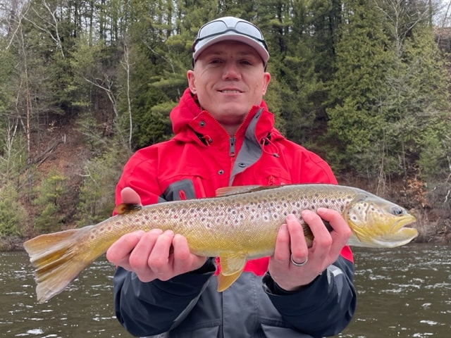 Calvin with a 22-inch brown trout