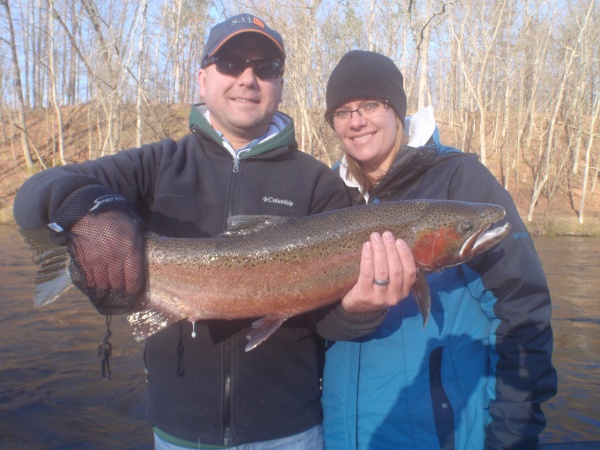 Andrew and Kristy with a Muskegon river steelhead