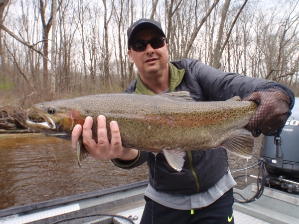 Bill with a male steelhead