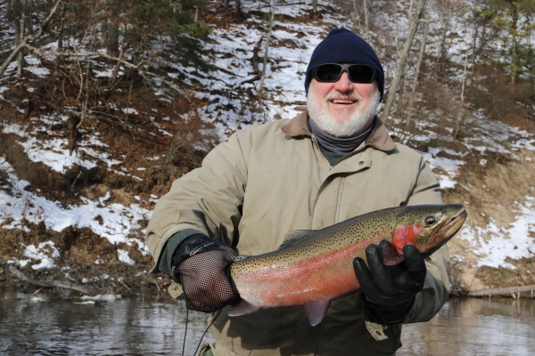 Dave with a bright colored steelhead